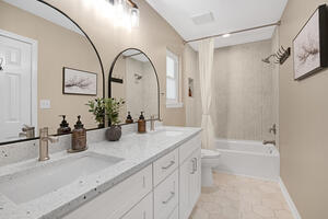 Granite vanities, renovated primary bath