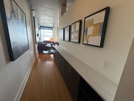 Generous cabinets in hallway for pantry storage