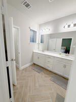 main suite bathroom with ceramic tile