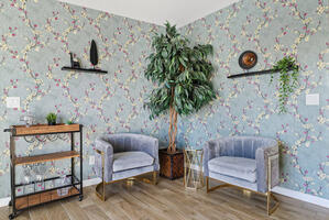 sitting room, backyard is to the left
