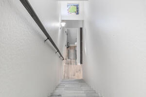 Stairs to garage & property