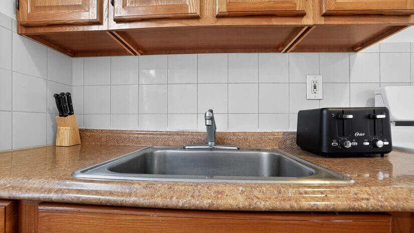 Kitchen with sink, countertop space, and essential appliance