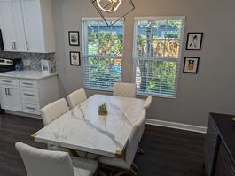 Dining table looks out onto garden