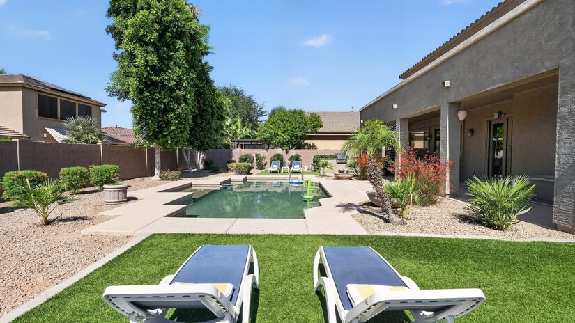 Large backyard to relax and rewind with a heated pool.