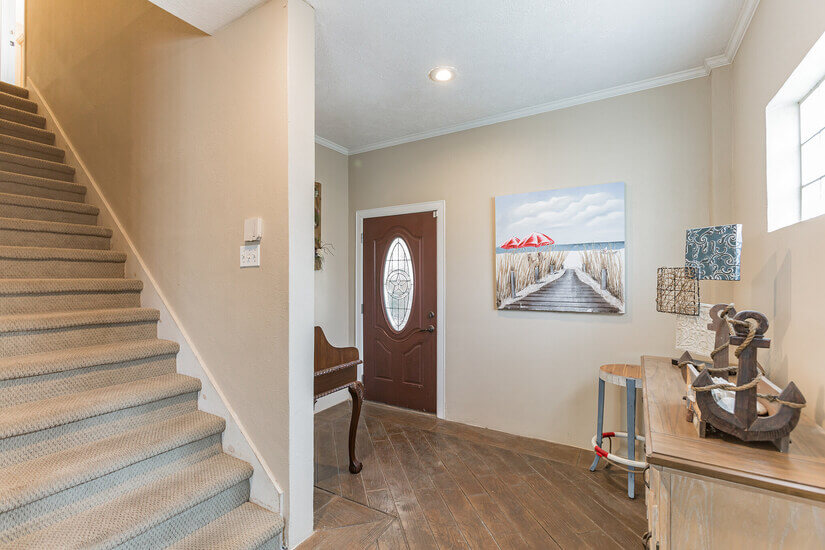 Front entry and stairwell to upstairs