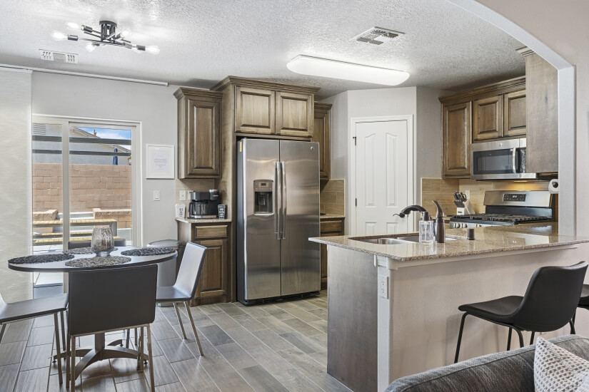 Combined dinning area and kitchen view from living area