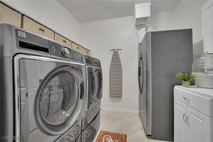 Laundry Room - full size machines with laundry shoot.