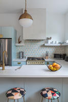 Chef’s kitchen with statement gold finishes