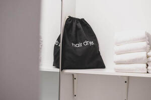 Fresh towels and hair dryer provided
