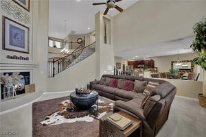 Living Room: large open concept space and a fireplace.