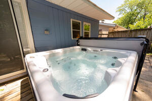 8-person hot tub offers delightful relaxation.