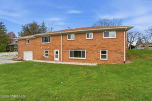Rear Exterior with Spacious Backyard
