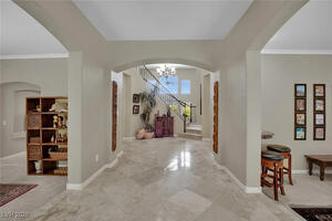Entryway, dining to the left, game room right