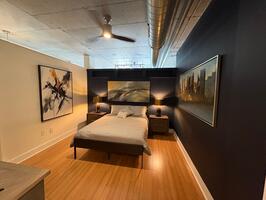 Spacious bedroom with queen platform bed