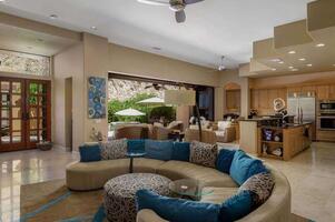 Living room, sitting area and foyer