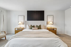 Elegant Mozter Bed with boucle pillows and blackout curtains