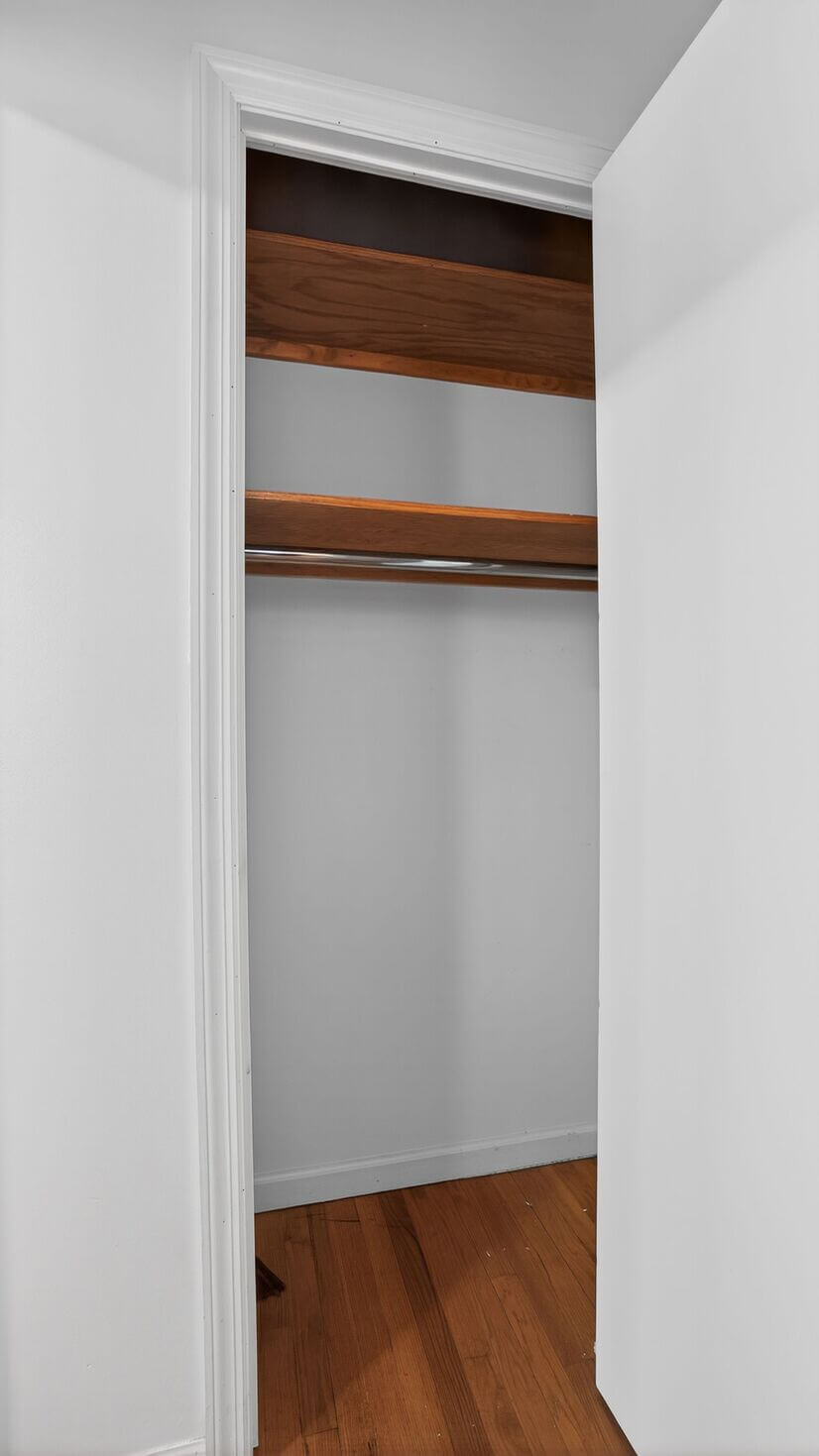 Walk-in closet with shelving and hanging space