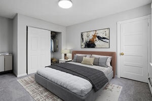 Master bedroom with comfortable queen bed