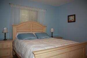 Front bedroom with queen bed.