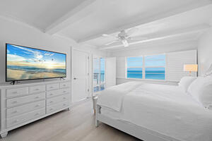 Master bedroom with tv