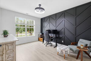 Executive Workspace with desk and monitors.