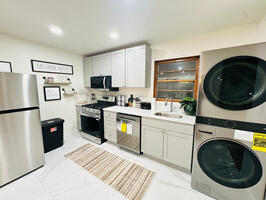 stove, washer,dryer and kitchenette,