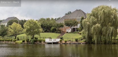 Pond View of Waterfront Executive Home