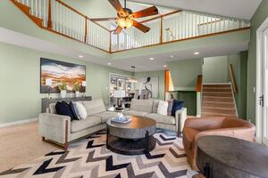 Open concept living and dining room two story