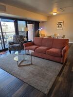 Living room with west facing covered balcony