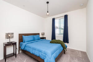 Queen Sized Bed in Guest Bedroom 1