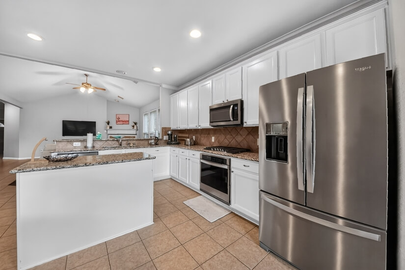 Kitchen includes updated appliances and Nespresso machine