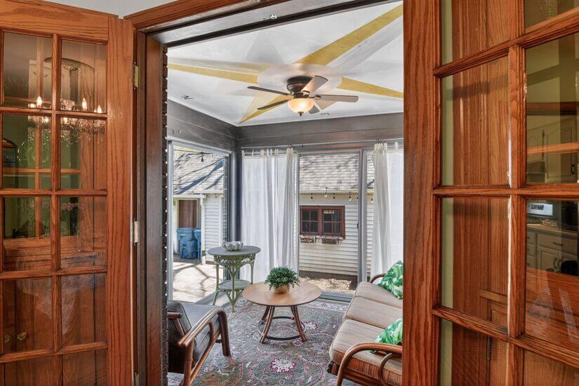 4 season porch offers year round outdoor ambiance.