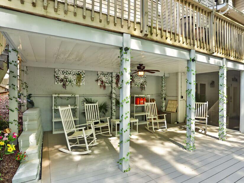 Rocking chairs w/ceiling fan, lighting, & game stored