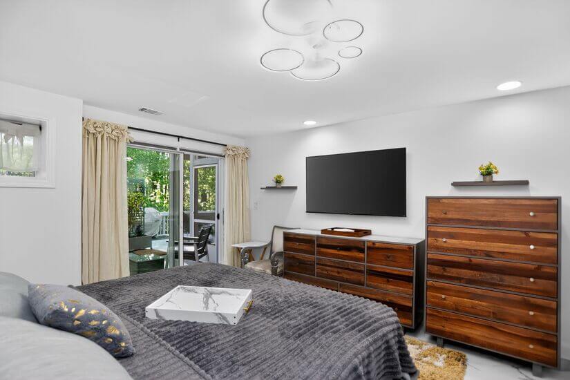 Primary sliding door w/ garden view.