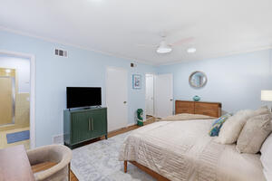 Primary Bedroom w/ TV