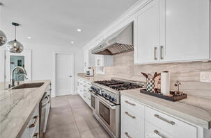 Kitchen includes cedar wine closet