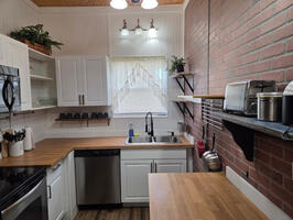 Full kitchen with dishwasher