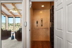 One of two elevators with sunroom next door