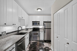 Brand new granite counter and cabinets.