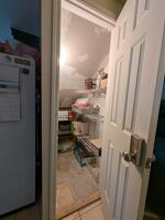 Storage area under stairs