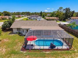Overhead View of Private Pool and Home