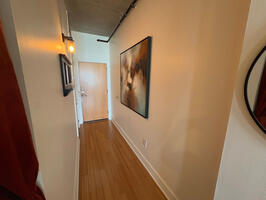 Well lit entryway w artwork