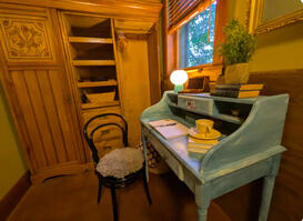 Queen bedroom with desk and closet