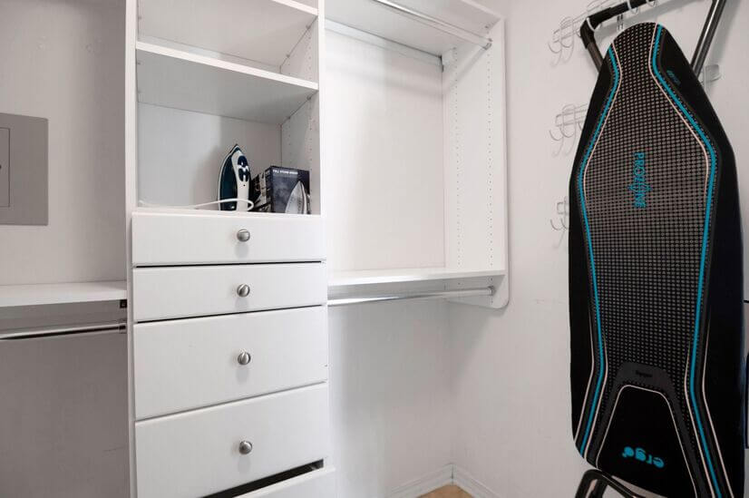 plenty of drawers and space, ironing board/iron