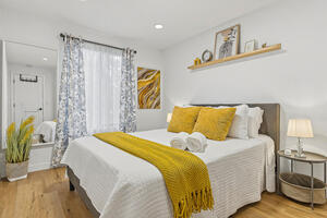 Upstairs bedroom with queen bed