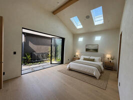 Spacious furnished primary bedroom suite