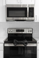 Electric glass cooktop/microwave