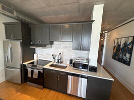 New tiled backsplash in kitchen