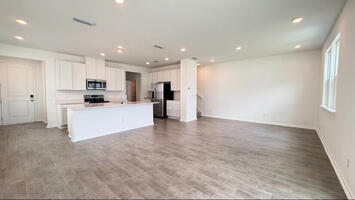 Kitchen great room with dining area and bar