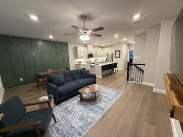 expansive living and dining adjacent to primary suite